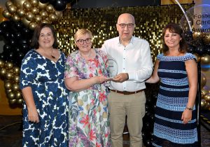 Norma and David, Lifetime Achievement Award with Kathleen Toner (Director of The Fostering Network NI) and Kerrylee Weatherall (Interim Director, Children's Community Services)