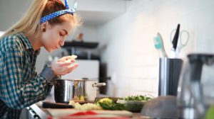 teen female cooking, kitchen setting