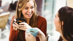 women drinking coffee together